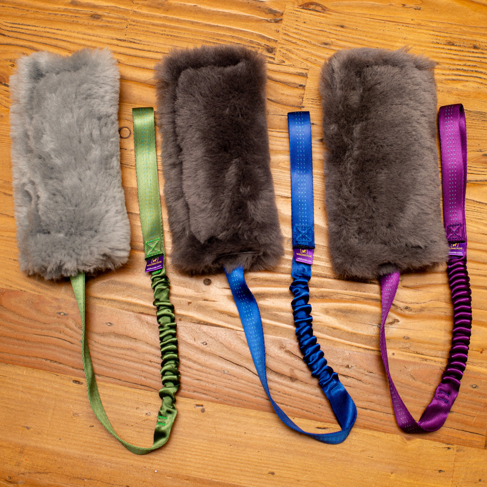 Wild-Tug Long Sheepskin Squeaker Tug Toy with Drag Line Bungee