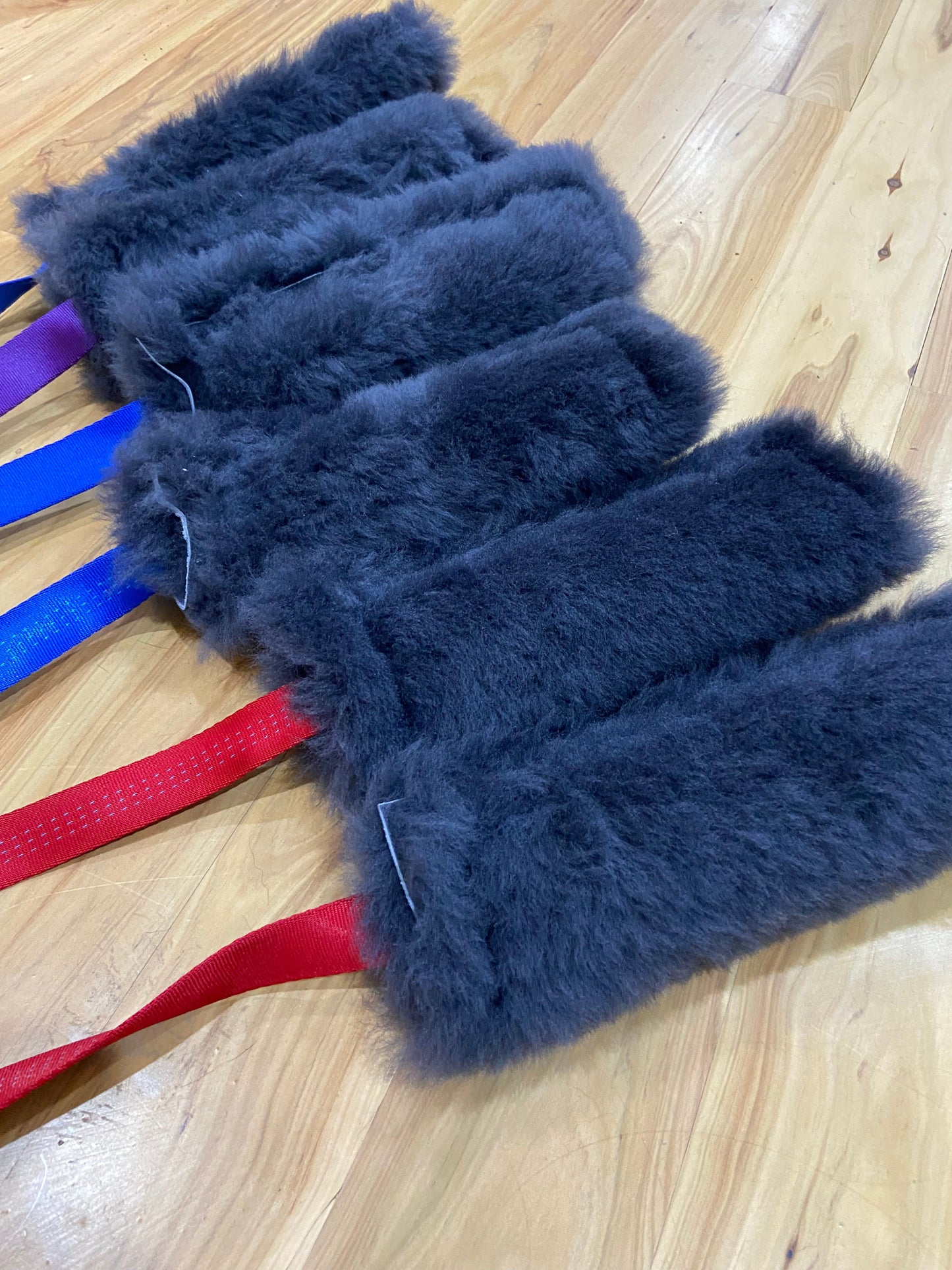 Wild-Tug Long Sheepskin Squeaker Tug Toy with Drag Line Bungee