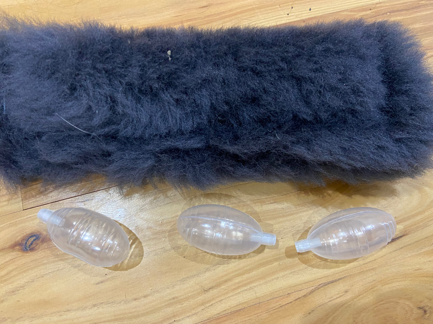 Wild-Tug Long Sheepskin Squeaker Tug Toy with Drag Line Bungee